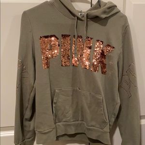 a PINK hoodie